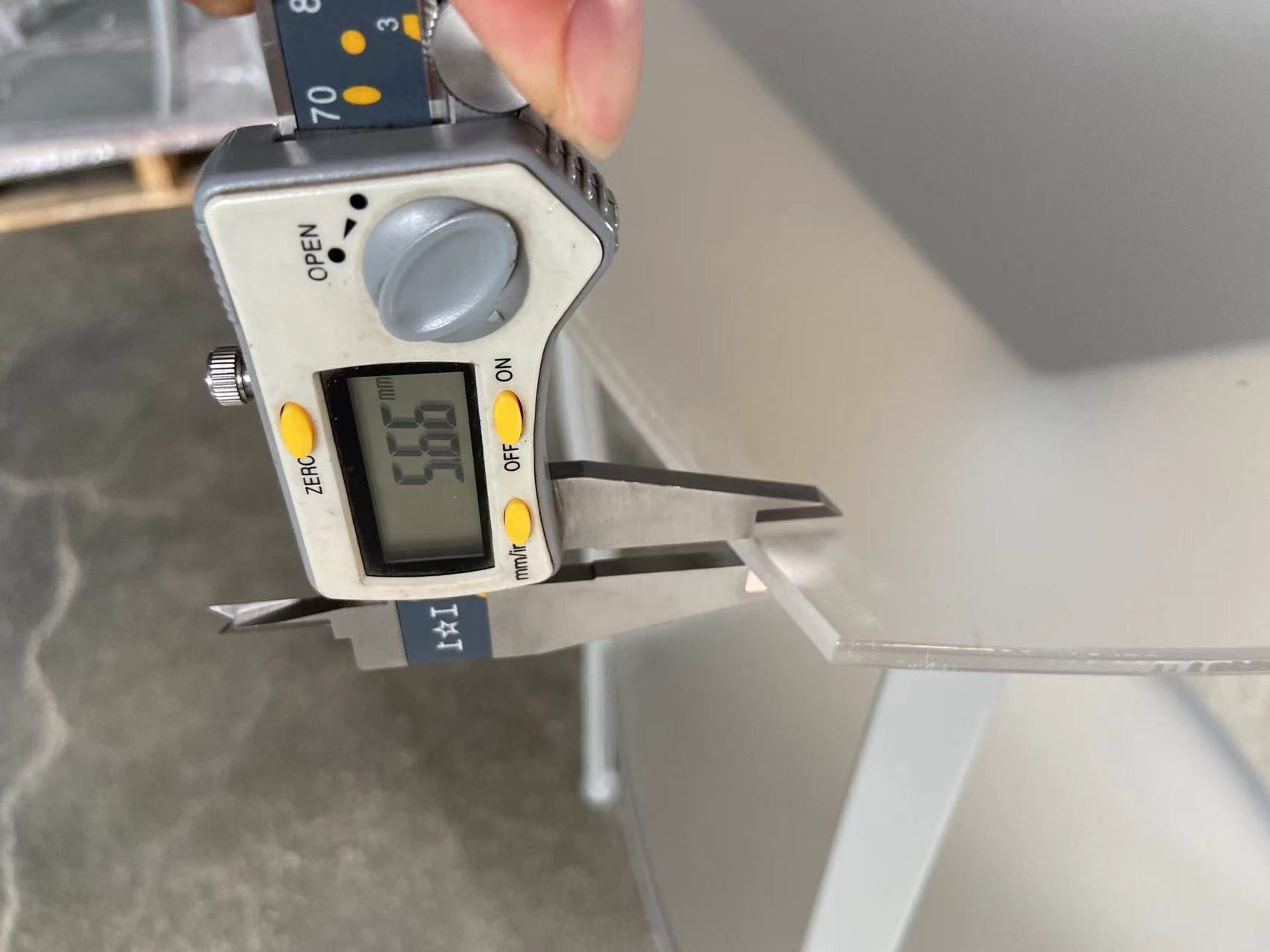 Caliper measurement during store fixture quality control